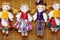 Cute handmade ragdoll dolls in Lithuanian national costumes sold on Easter market in Vilnius, Lithuania