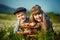 Cute handsome boy wearing jeans and shirt sittingand playing on wooden chair together with beautifull girl on meadow of chamomiles