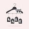 Cute hanging SALE tags on clothing hanger with big stripy bow decoration icons