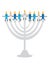 Cute Hanukkah candles with smiling face sitting on Hanukkah menorah