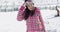 Cute and happy female asian snowboarder