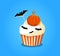 Cute happy halloween cupcake with pumpkin and bats on b