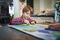 Cute happy little boy, adorable preschooler, painting in a sunny art studio. Young artist at work