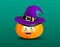 Cute happy smiling pumpkin head witch purple hat and scary funny decor of spider on cobweb on dark green background. Halloween ico