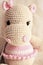 Cute Hippopotamus crochet in vintage background. Toy for kids. Hippo knitting. Handmade. Hippie soft toy Cute woolen. Hippie baby