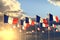 Cute holiday flag 3d illustration - many France flags on sunset placed in row with soft focus and place for content