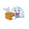 Cute igloo cartoon character having a box