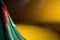 Cute image of Turkmenistan flag hanging in corner on yellow with bokeh and free space for your text - any holiday flag 3d