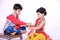 Cute Indian child brother and sister celebrating raksha bandhan festival ,