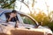 Cute Indian Child waving from car window