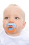 Cute infant with pacifier