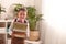 Cute inquisitive little schoolboy wears school textbooks. Back to school