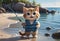 cute kitten with a fishing rod on the seashore. warm summer day by the sea.