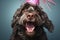 Cute labradoodle dog in party hat, celebrating with falling confetti at birthday party