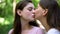 Cute lesbians kissing passionately, public demonstration of love, lgbt rights