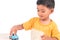 Cute little asian boy child kid preschooler playing toy car