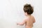 Cute little baby boy drawing with crayon color on the wall. Works of child. Works of child. Caucasian brunette child 1 year old. A
