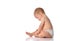 Cute little baby in nappy on floor studio portrait