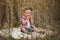 Cute little boy in autumn wheat field