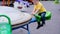 Cute little boy with Down syndrome trying modern playground equipment