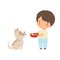Cute Little Boy Feeding His Puppy, Adorable Kid Caring for Animal Cartoon Vector Illustration