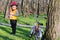 Cute little boy with his bike in woodland