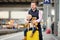 Cute little boy and his father waiting express train on railway station platform