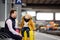 Cute little boy and his father waiting express train on railway station platform