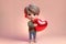 a cute little boy hugging a big red heart, ai generated