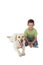 Cute little boy kneeling with his labrador dog smiling at camera