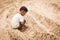 Cute little boy play sand