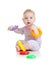 Cute little boy playing colorful toys