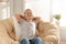 Cute little boy relaxing in papasan chair