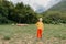 Cute little boy with a sheeps on farm, best friends, boy and lamb against the backdrop of greenery, poddy and child on