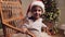 Cute little boy sitting in the rocking chair