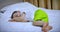 Cute Little Boy is Sleeping Sweetly in Bed, Concept of Baby Sleep.