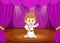 Cute little boy wearing angel costume on stage