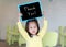 Cute little child girl holding blackboard showing text ` Thank You ` in kids room.