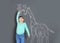 Cute little child measuring height near chalk giraffe drawing on grey