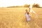 Cute little children with kite in field