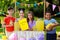 Cute little children at lemonade stand. Summer refreshing natural drink