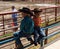 Cute little cowboys at a rodeo in colorado