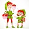 Cute little elves Santa`s assistant with gifts