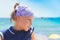 Cute little girl in bandanna at summer day