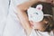 Cute little girl closeup sleeping in bed wearing white cat plush sleep mask. Early morning wake up, rise to kindergarten, school.