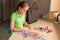 Cute little girl creating toys with chenille sticks