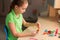 Cute little girl creating toys with chenille sticks