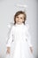 Cute little girl dressed as an angel