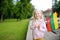 Cute little girl holding tricolor Lithuanian flag