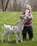 Cute little girl with lamb